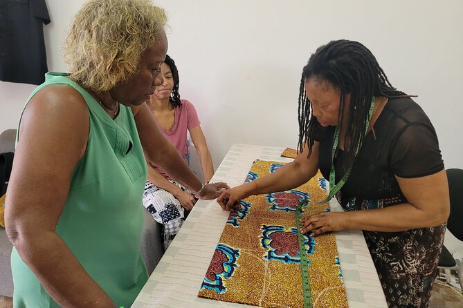 African custom clothing making experience with fabric tour - Cutting, stitching, and the final fitting