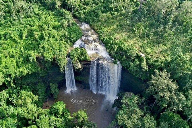 Boti Falls, Umbrella Rock, Aburi Gardens & Cocoa Farm Day Tour - Climbing Umbrella Rock