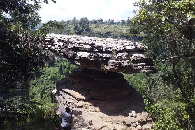 Experience Aburi Botanical Gardens And Boti Water Falls In A Day. - Swimming beneath the falls