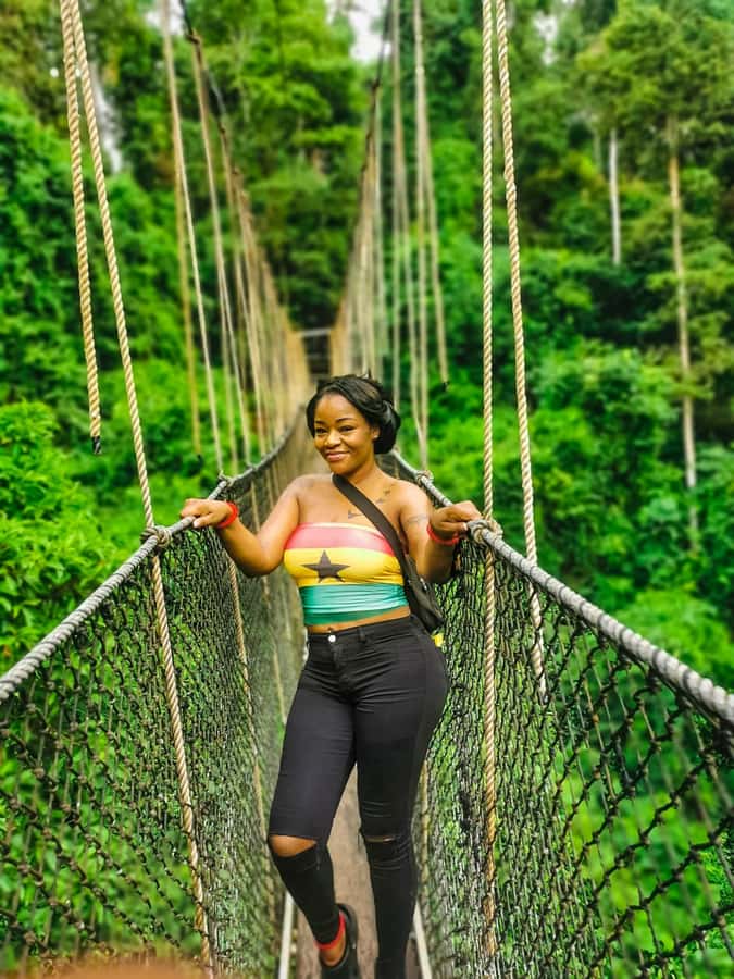 A rope walkway strung through the rainforest canopy at Kakum