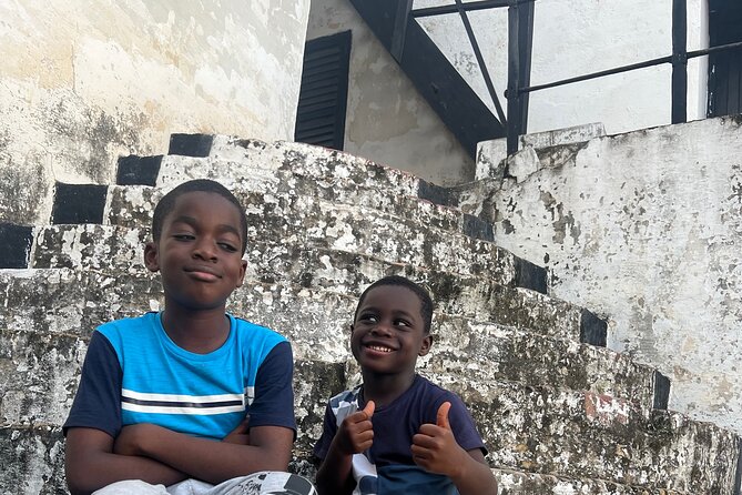 HERITAGE GHANA(Cape Coast Castles and Kakum National Park) - Elmina Castle and the fishing town beside it